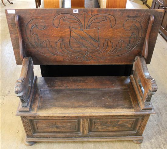 Carved oak monks bench